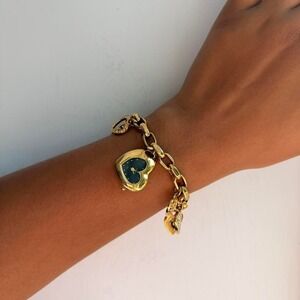 GOLD TONE ARMITRON NOW HEART CHARM BRACELET WATCH